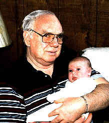 Carl Estes with new grandbaby Amanda Leigh Estes